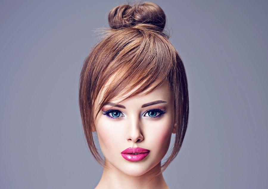 short hair bun with side swept bangs