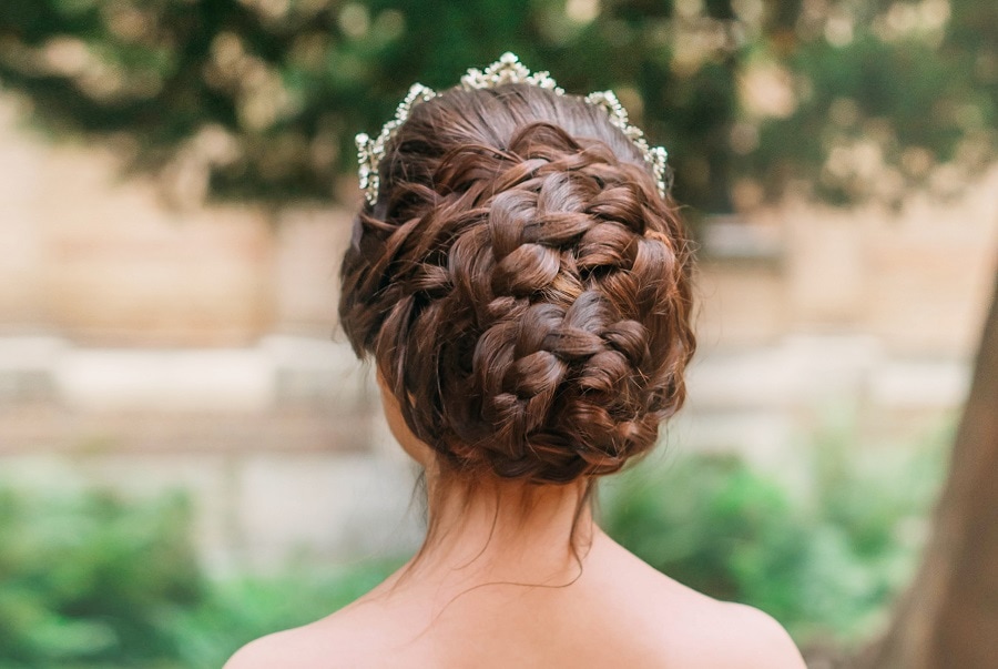 thick braided bun hairstyle for prom
