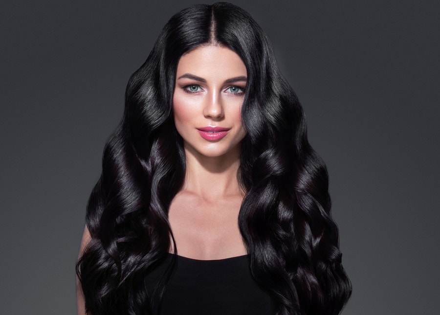 woman with middle part jet black hair