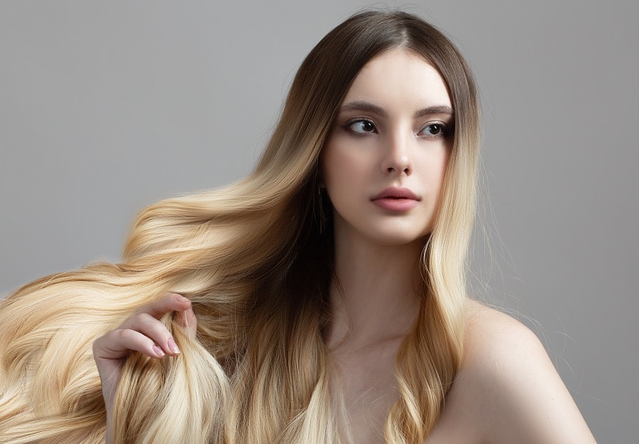 woman with middle part ombre hair