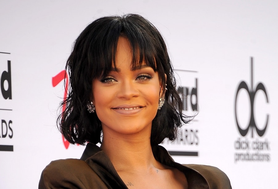 Rihanna's short hair with middle part bangs