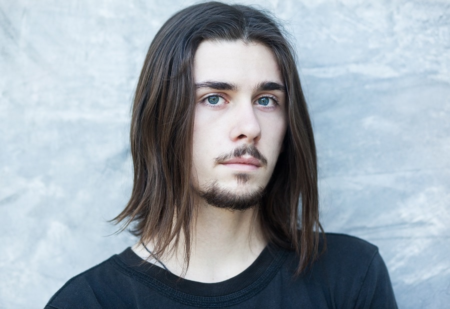 guy with middle part long hair