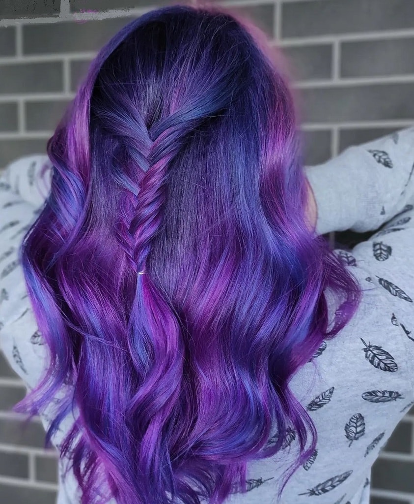 half braided hairstyle with violet hair