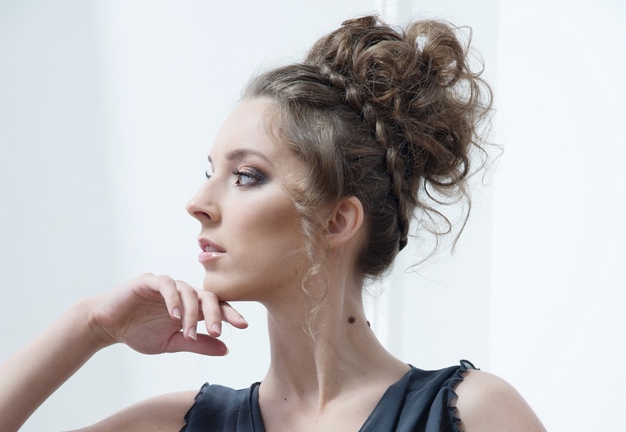 messy updo with crown braid for long hair