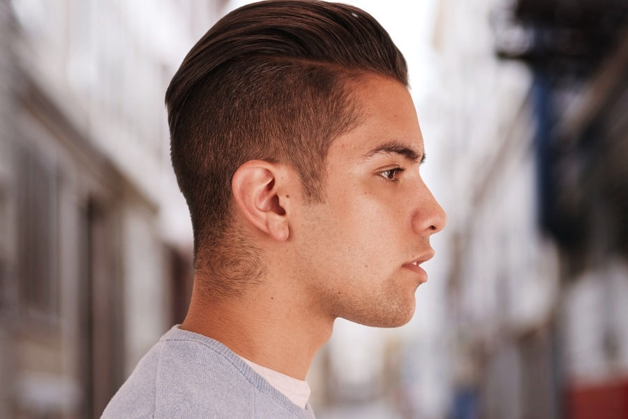 slicked back undercut hairstyle for men