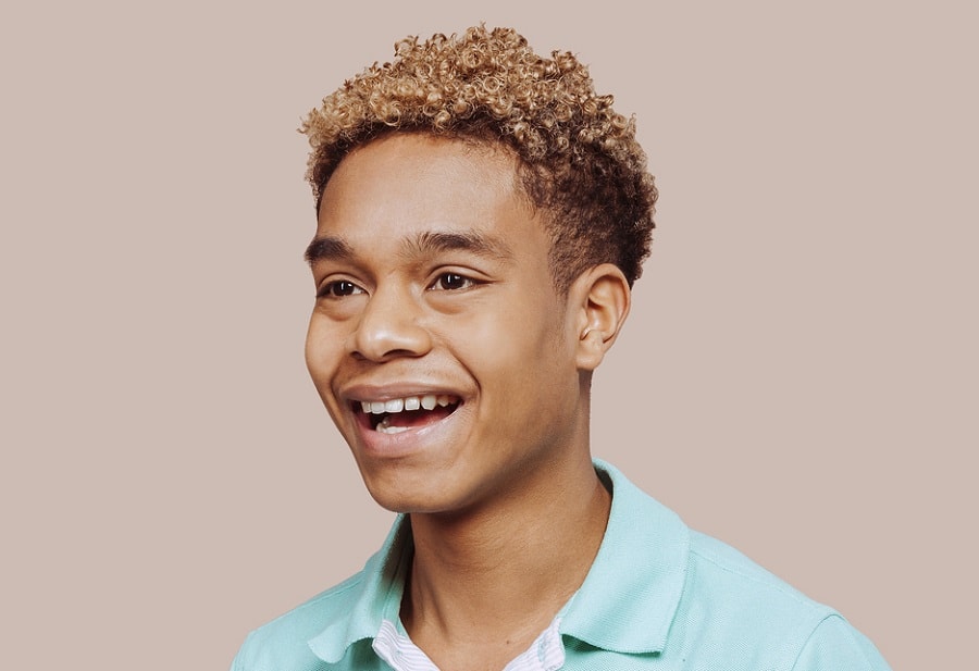 teen black boy curly hair with highlights