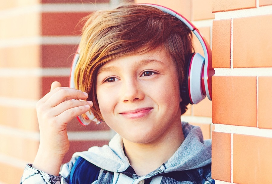 teen boy haircut with long bangs