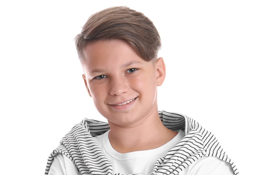 teen boy with side part hairstyle