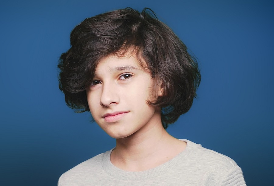 teen boy with thick bob