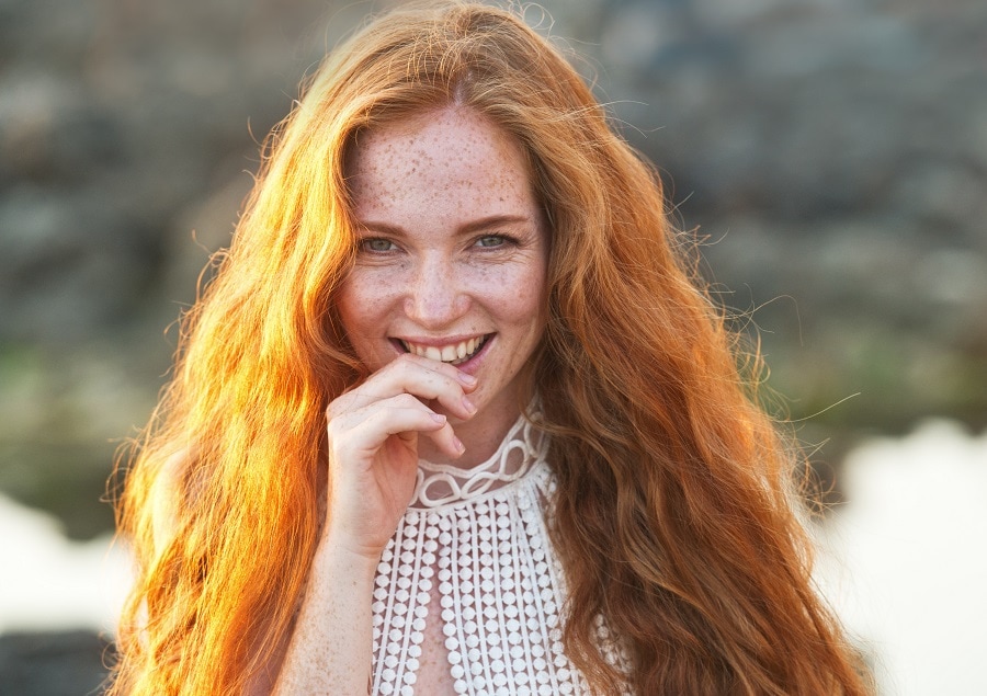 beach wedding hairstyle with long red hair