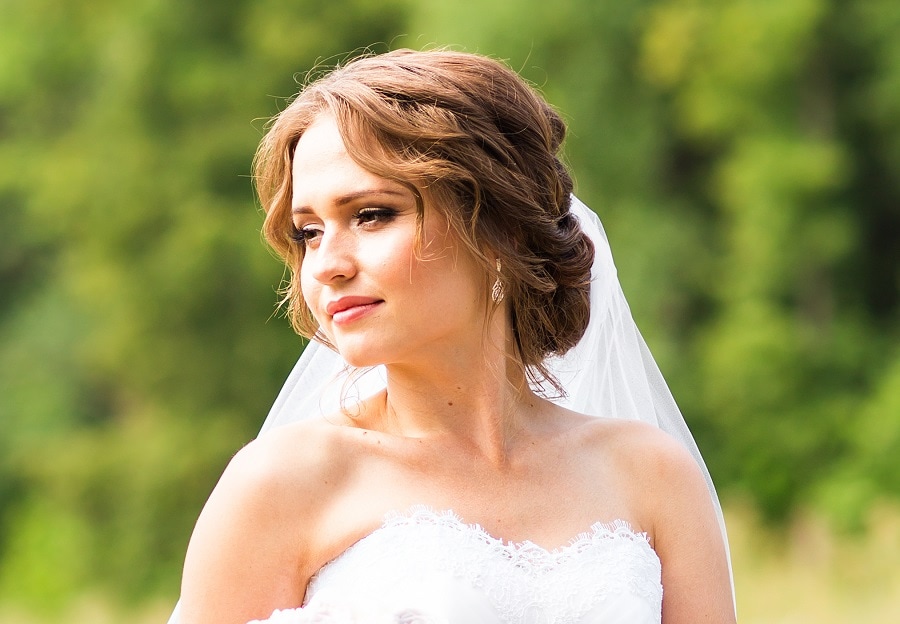 loose low updo for beach wedding