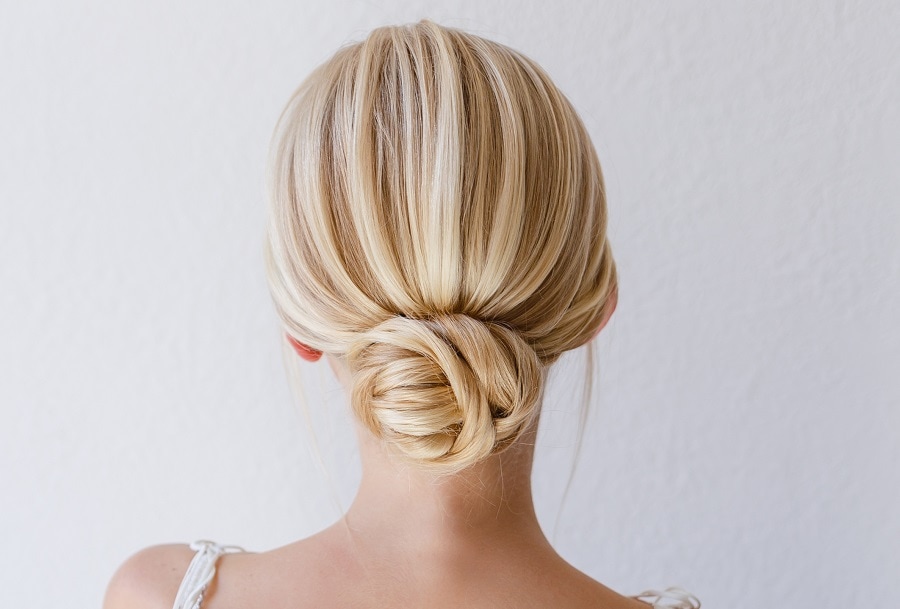 blonde updo for wedding guest