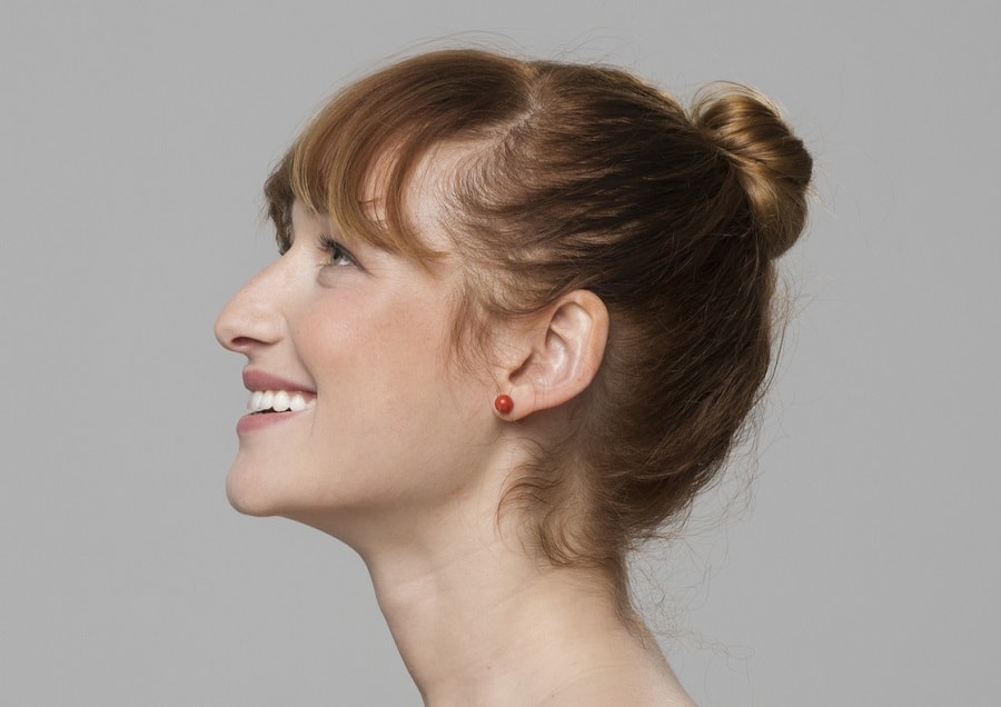 casual updo for medium hair with bangs
