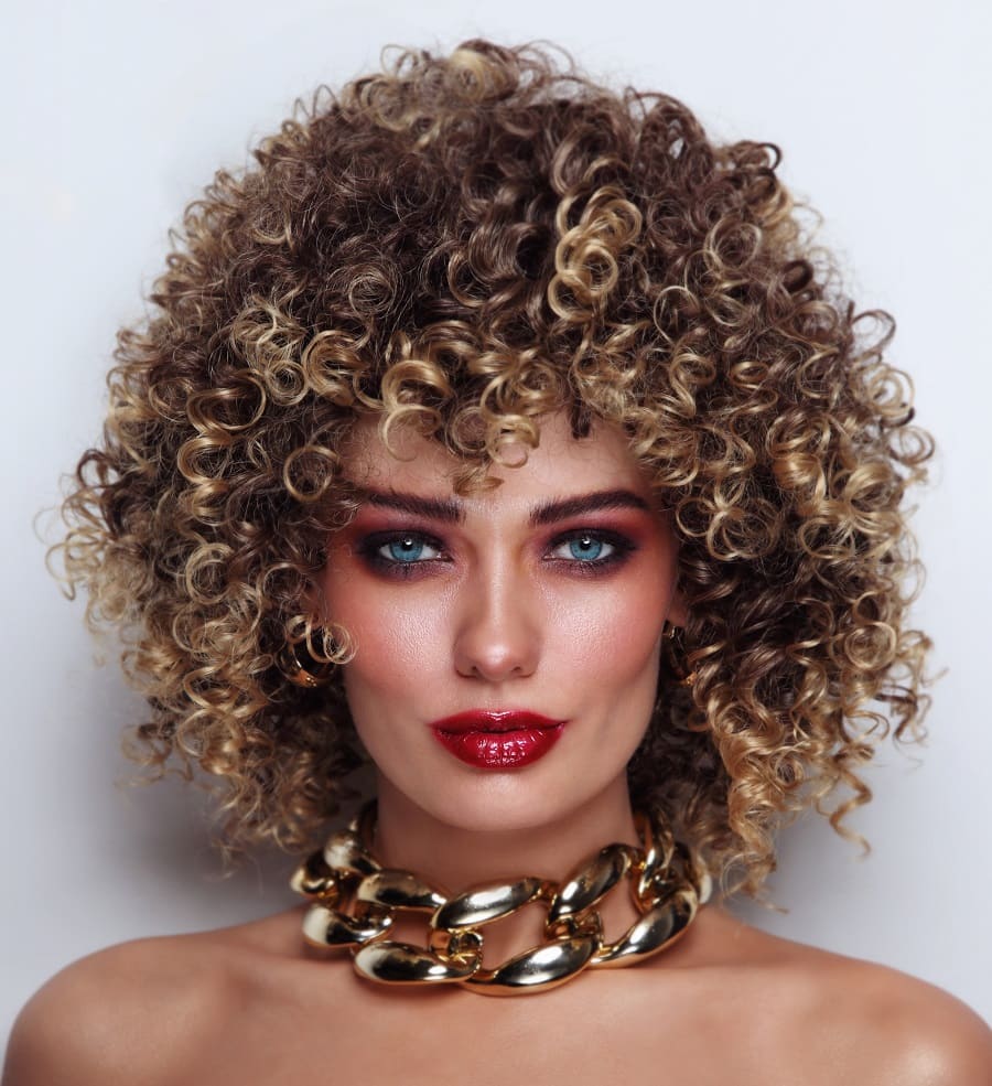curly brown shag with blonde highlights