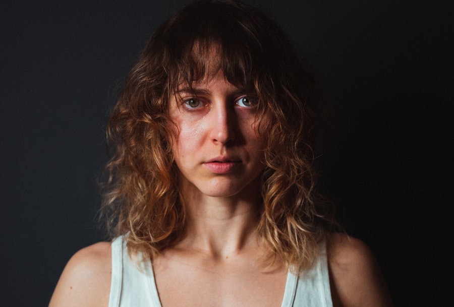 curly hair with wispy bangs