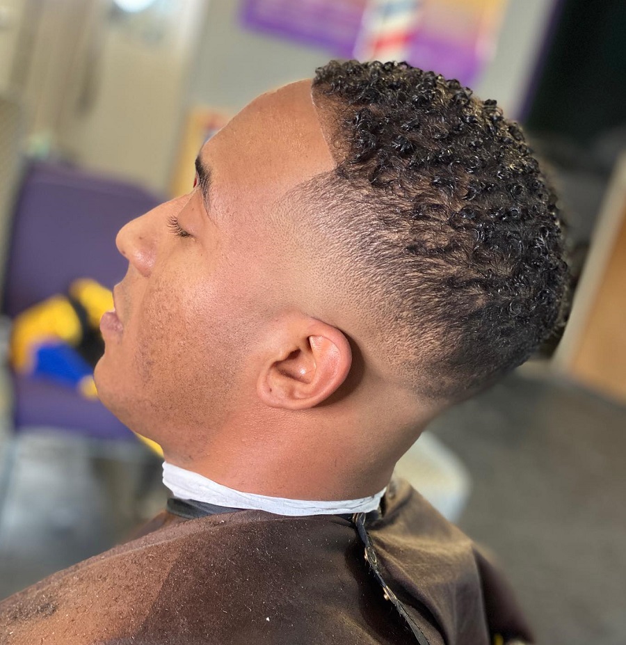 curly low fade haircut for black men