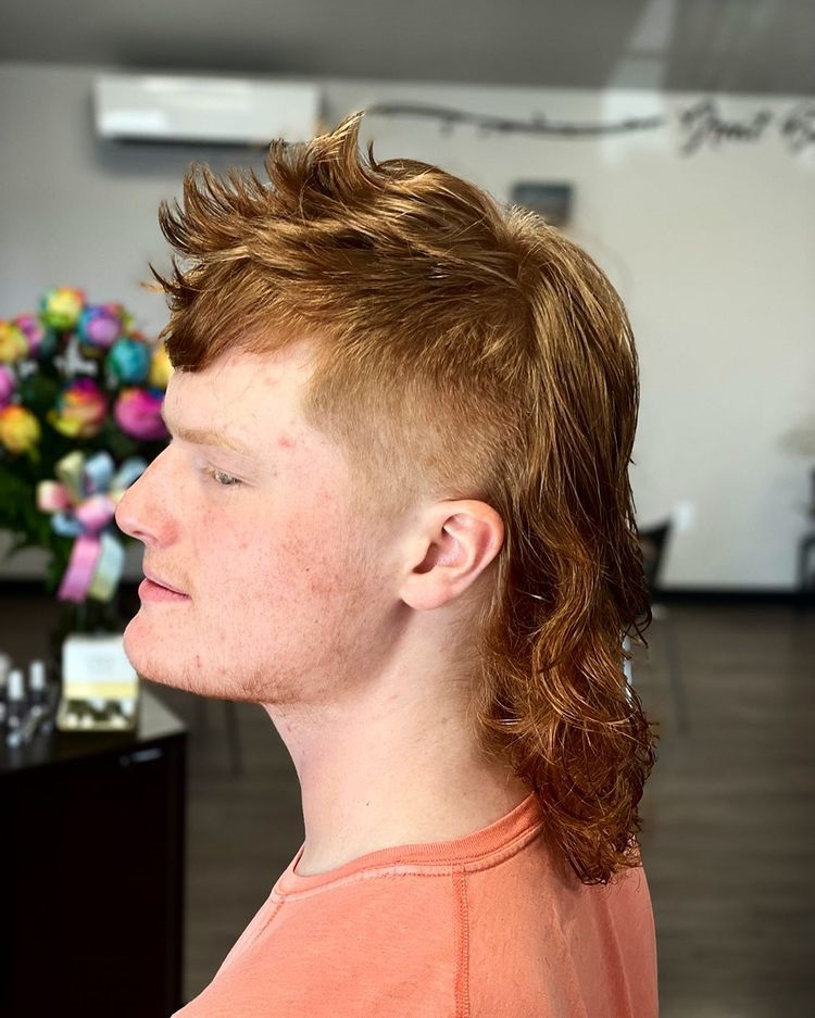 guy with ginger mullet haircut