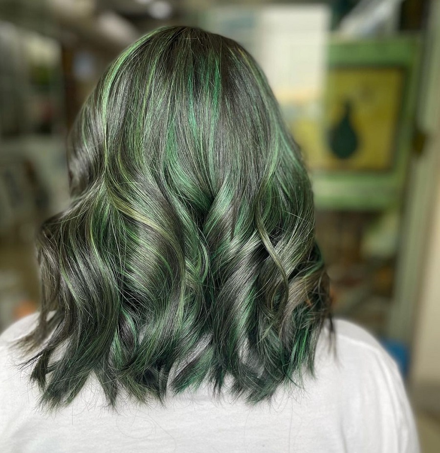 long inverted bob with green highlights