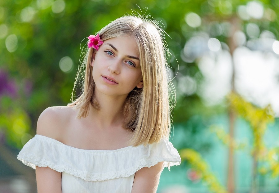 middle part hairstyle for wedding guest