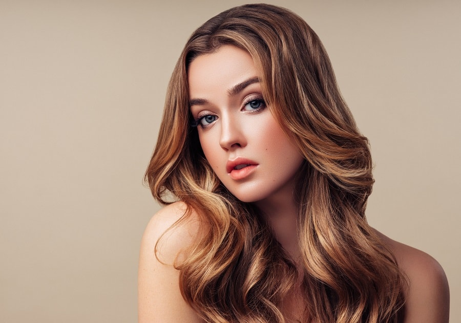 middle part hairstyle with golden brown hair
