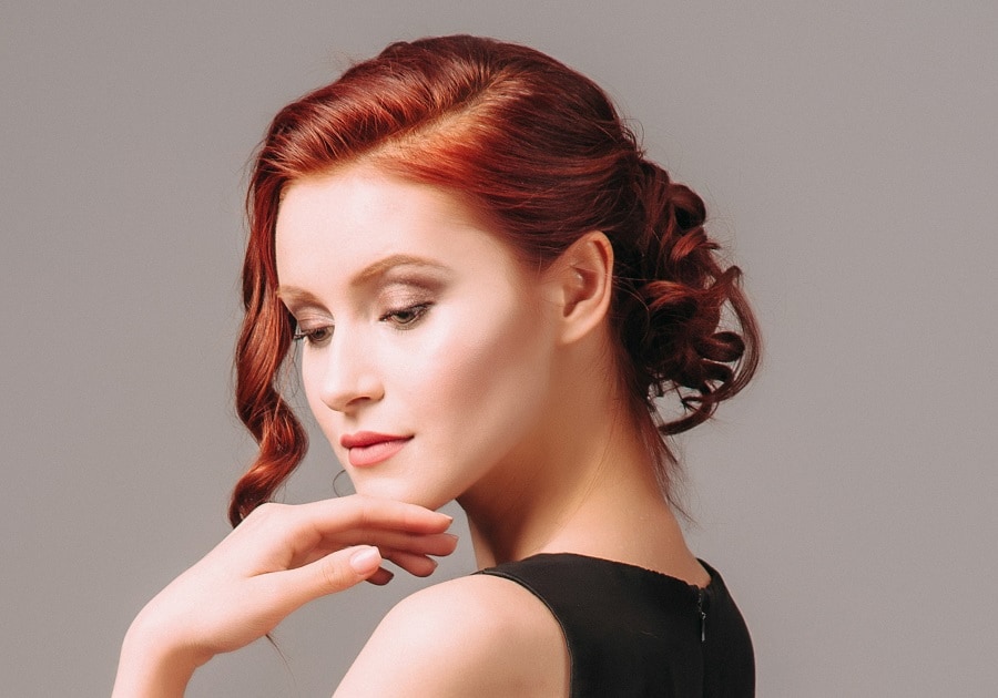 red hair updo for wedding guest