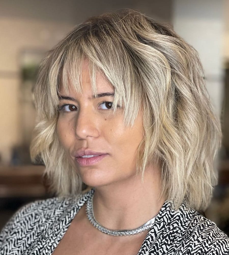 wavy bob with feathered bangs