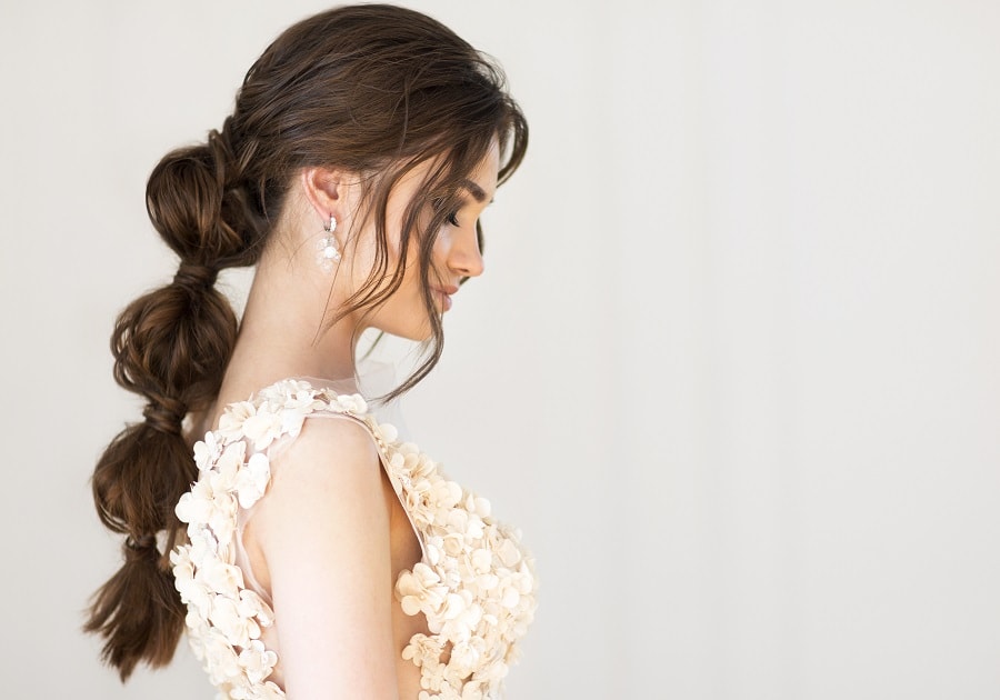 wedding guest with bubble ponytail hairstyle