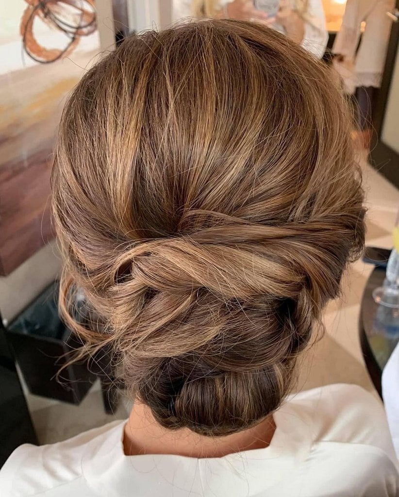 wedding updo with caramel highlights