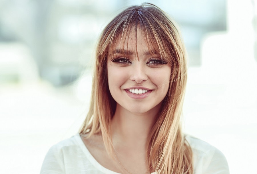 wispy bangs with blonde highlights