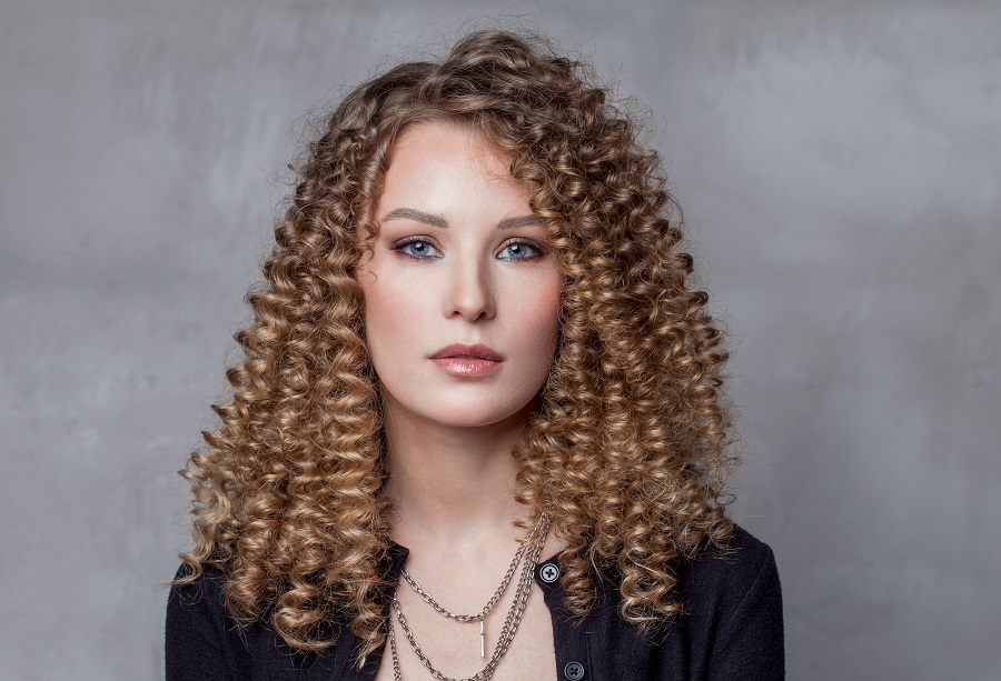 caramel balayage with curly perm hair