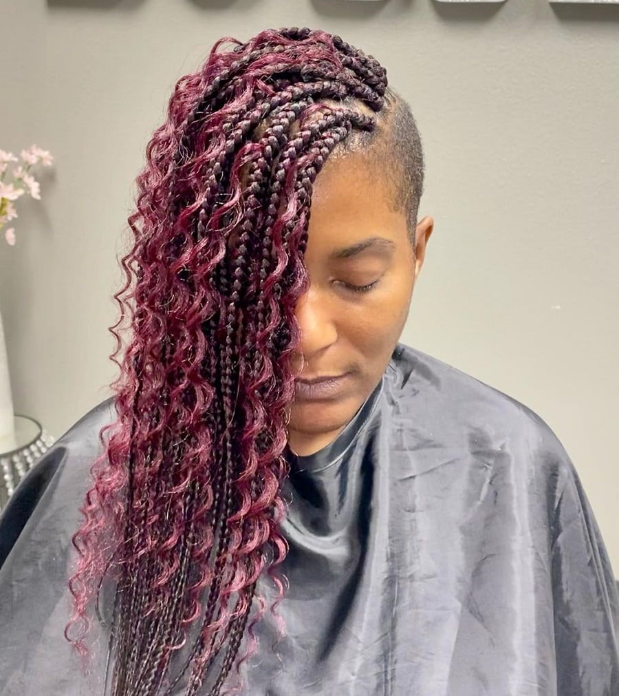 curly braided hairstyle with shaved side