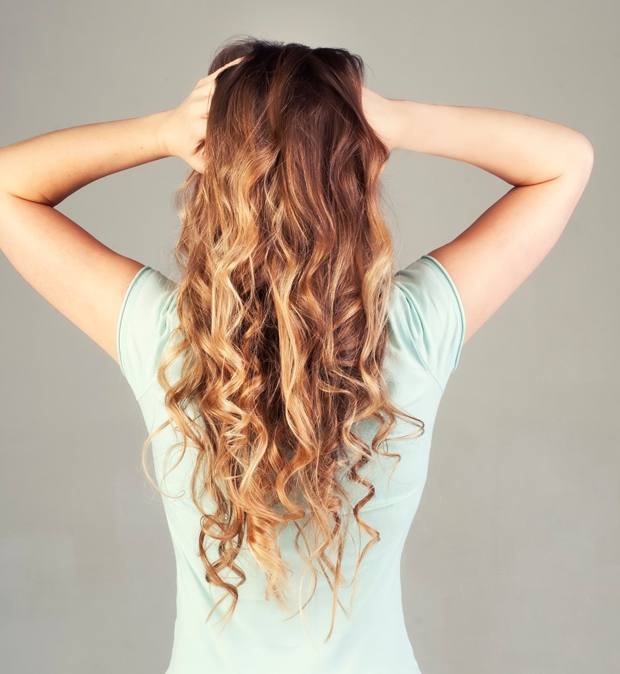 curly light brown hair with blonde highlights
