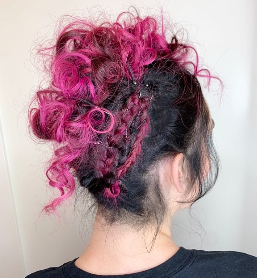 curly mohawk updo with pink highlights for women