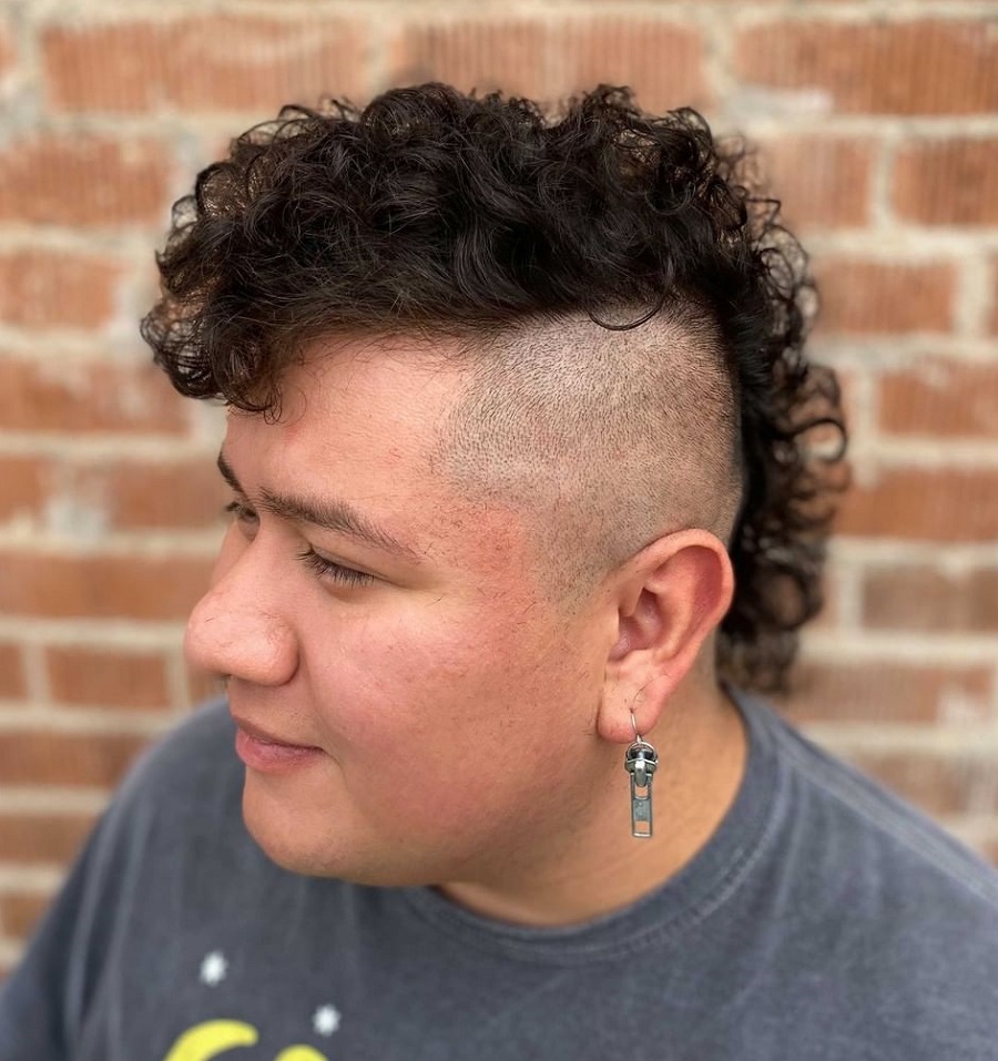 curly mohawk with shaved side for women