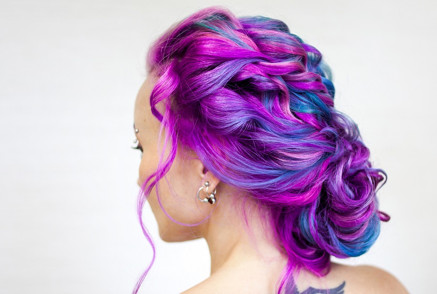 curly updo with purple highlights