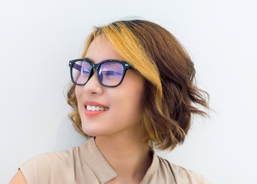light brown bob with face framing highlights