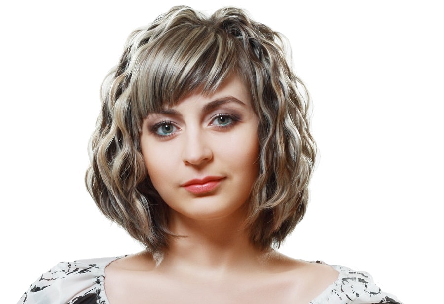 thin wavy bob with bangs for silver gray hair