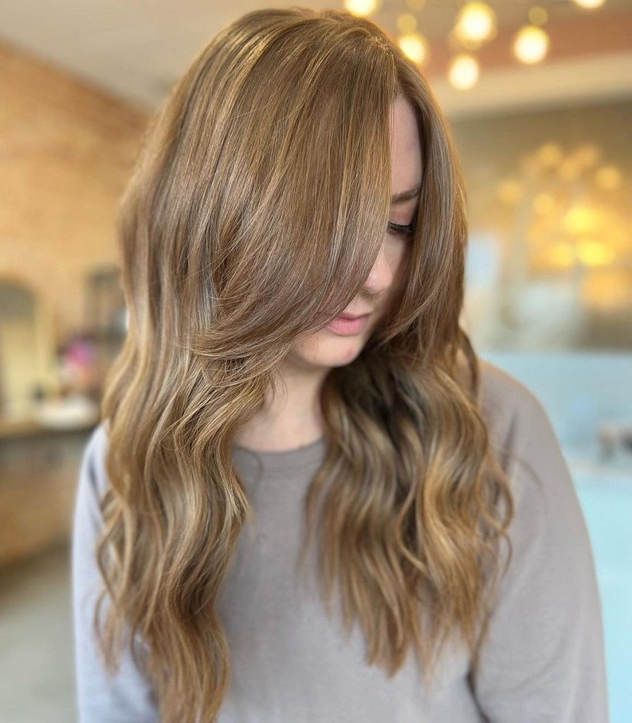 copper blonde hair with side swept bangs