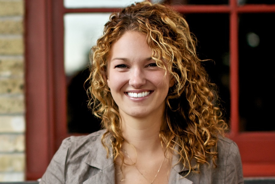 curly dark brown hair with honey highlights