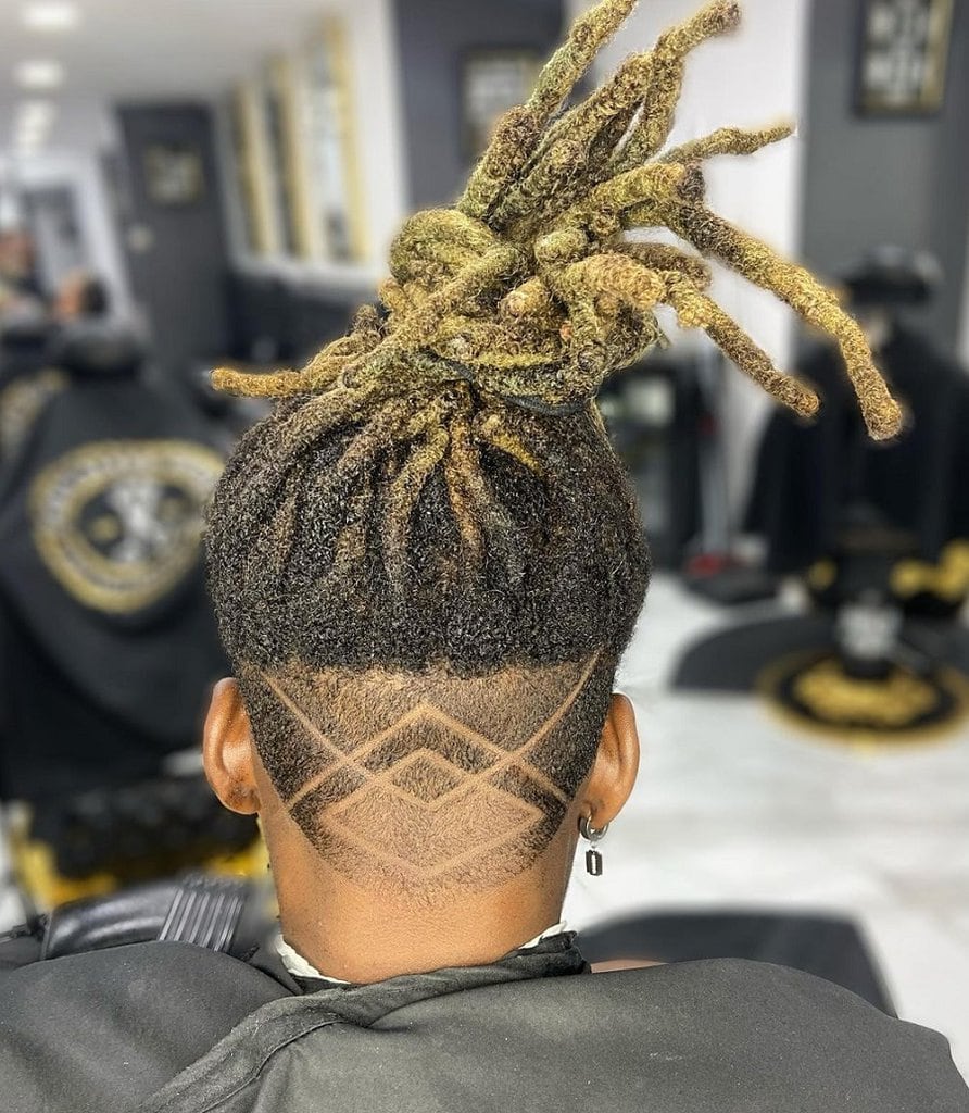 dreadlocks hairstyle with design