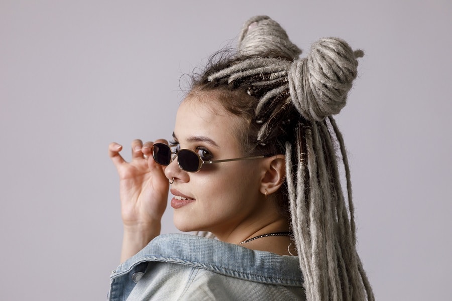 half up space buns with yarn dreads