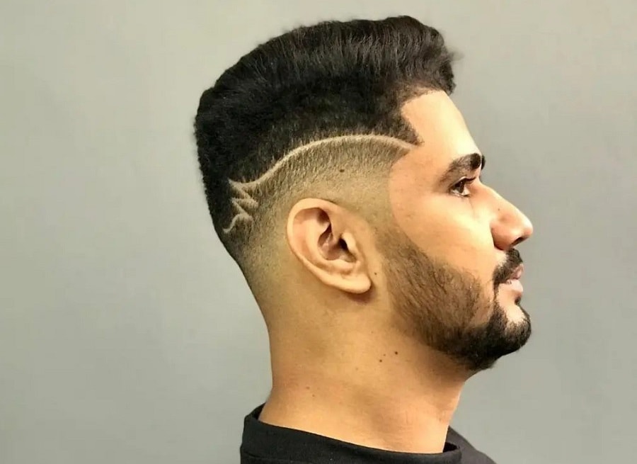 low fade haircut with design