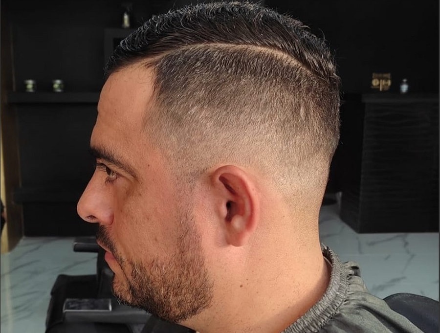 low fade haircut with hard part