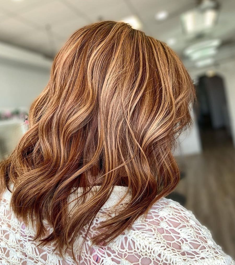 partial balayage on auburn red hair