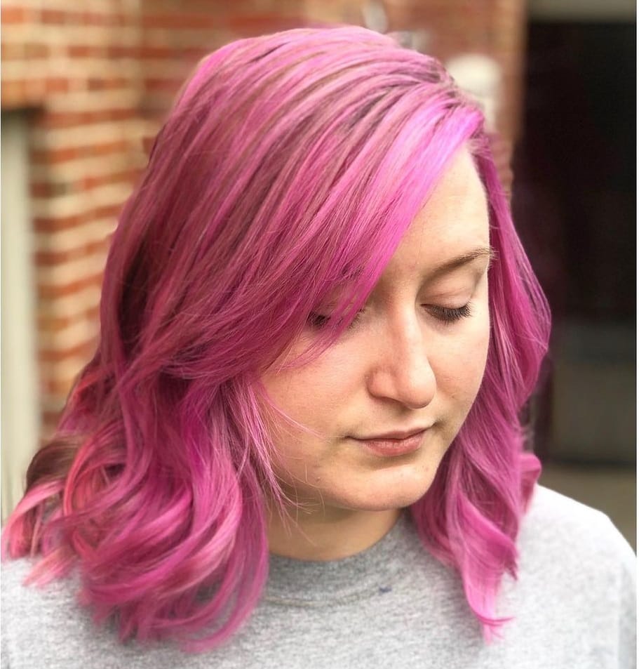 pink hair with side swept bangs
