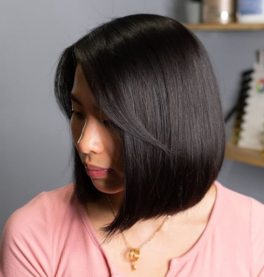 sleek bob with side swept bangs