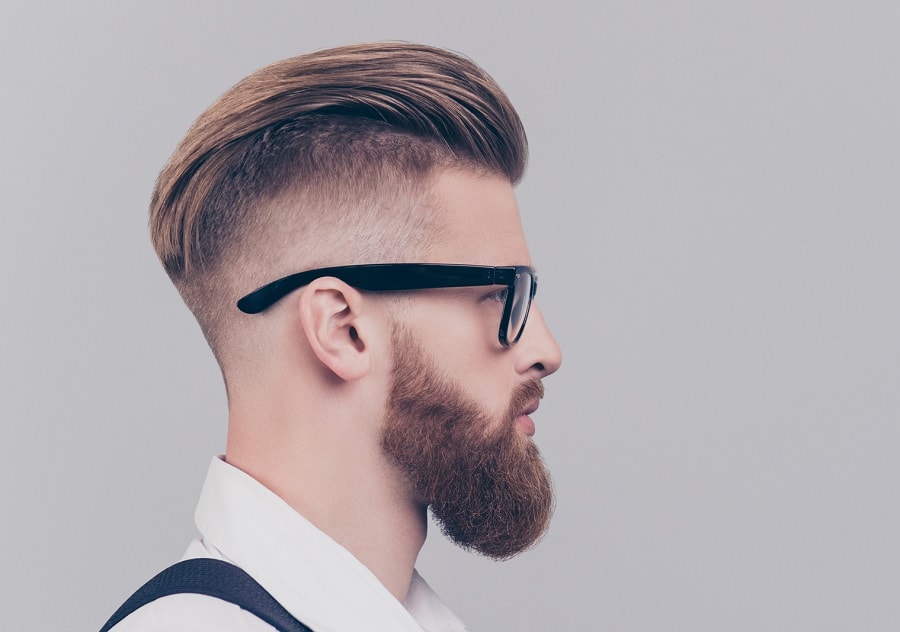 slicked back hairstyle with drop fade