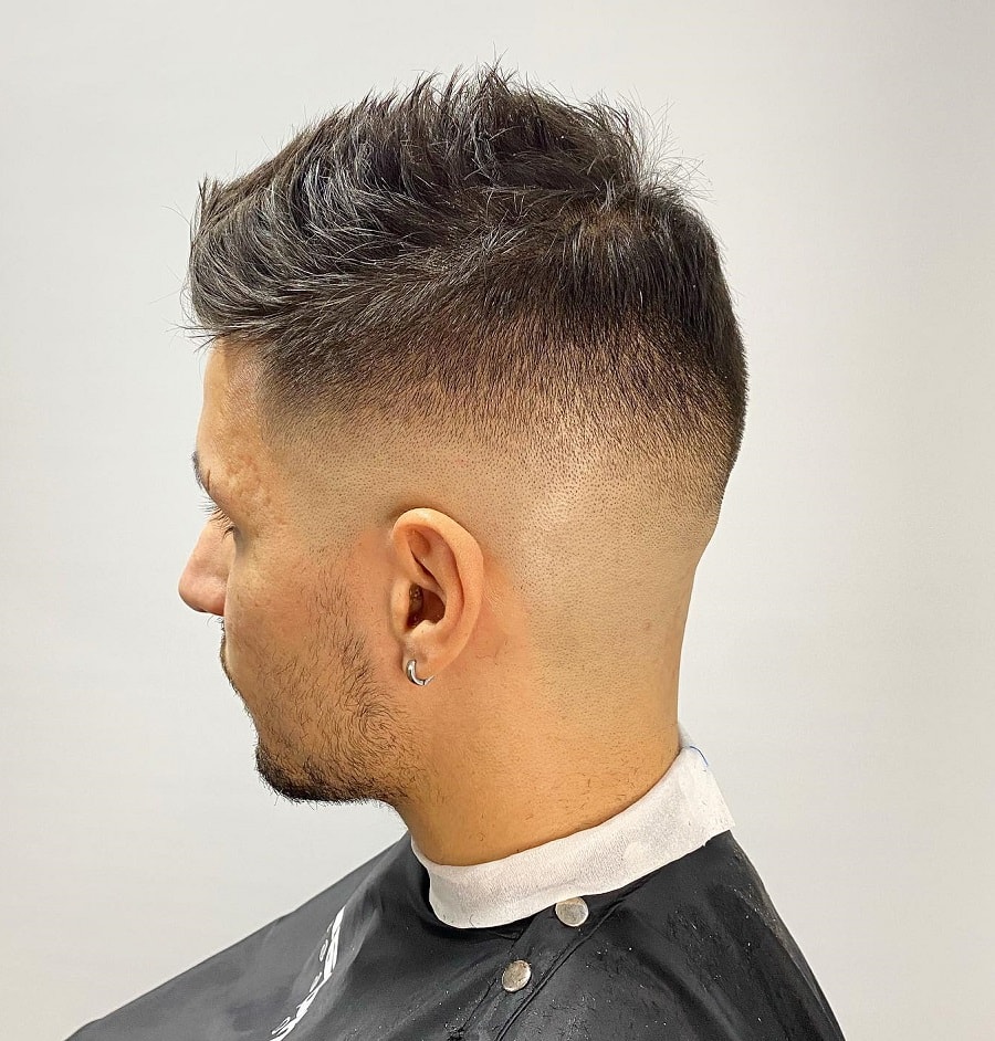 spiky hairstyle with high drop fade