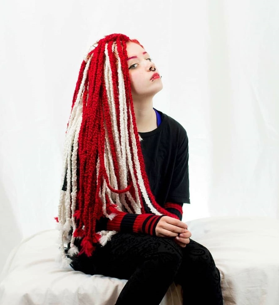 white and red yarn dreads