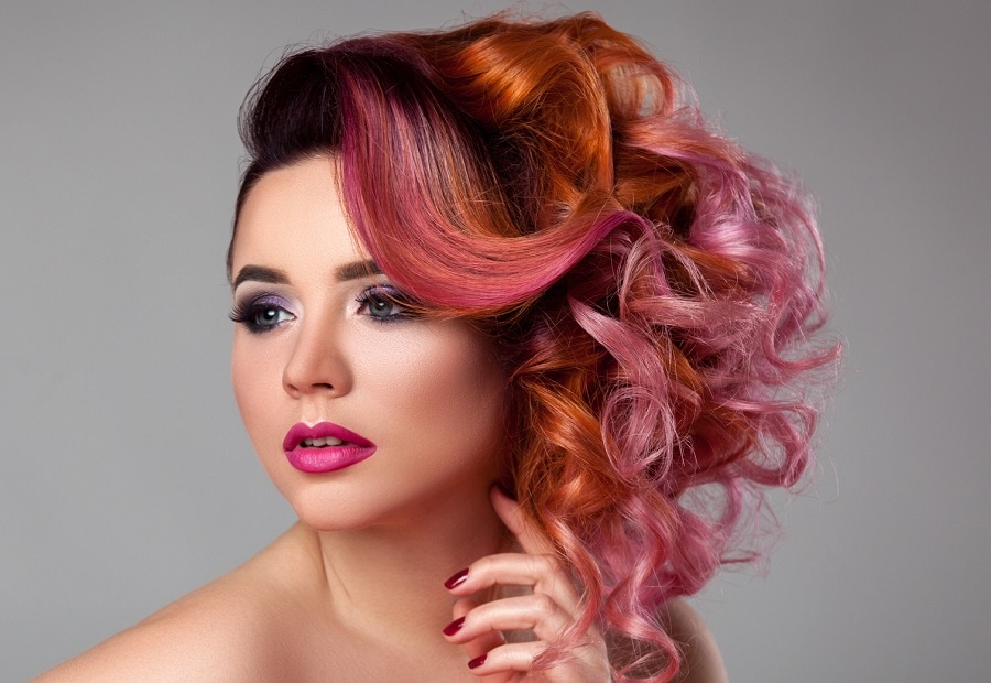 curly updo with pink highlights